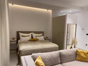 Łóżko lub łóżka w pokoju w obiekcie Lifestyle Apartments