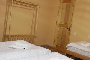 Letto o letti in una camera di guest house kesa