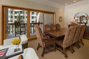 a dining room with a table and chairs at Village Center 611 in Durango Mountain Resort
