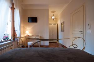 TV a/nebo společenská místnost v ubytování Bed & Breakfast Corte Toro