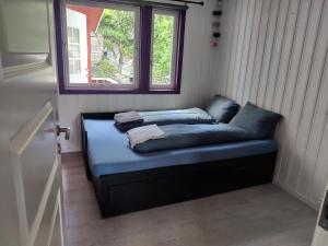 Postel nebo postele na pokoji v ubytování FeelHome 3 bedroom Near University