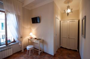 TV a/nebo společenská místnost v ubytování Bed & Breakfast Corte Toro
