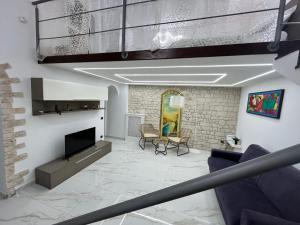 TV a/nebo společenská místnost v ubytování casa esmeralda