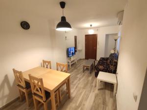 TV a/nebo společenská místnost v ubytování Centre Sweet Home