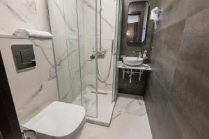 Koupelna v ubytování Bellevue Boutique Hotel