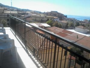a balcony with a view of a city at Tropea center room in Tropea