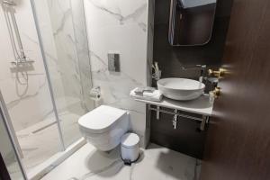 Koupelna v ubytování Bellevue Boutique Hotel