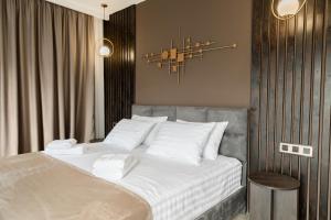 Postel nebo postele na pokoji v ubytování Bellevue Boutique Hotel