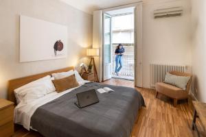 Ένα ή περισσότερα κρεβάτια σε δωμάτιο στο Ortigia Suite - Archimede