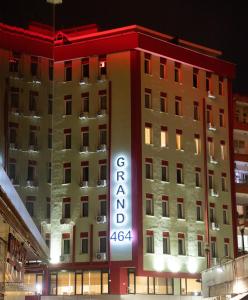 a building with a sign on the side of it at Grand 464 Otel in Rize