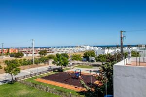 a view of a playground with a playground at Tavira Balsa Romana - Luz de Tavira in Luz de Tavira
