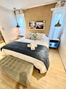 Postel nebo postele na pokoji v ubytování Santa Dominga