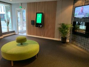 TV a/nebo společenská místnost v ubytování Bodø Hotel