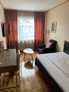 Postel nebo postele na pokoji v ubytování Bodø Hotel