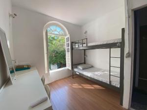 Aurora Hostel Rio客房内的一张或多张床位