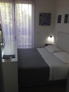 Postel nebo postele na pokoji v ubytování B&B Pitstop