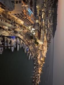 an aerial view of a marina at night at Strada Marina Hotel in Zakynthos