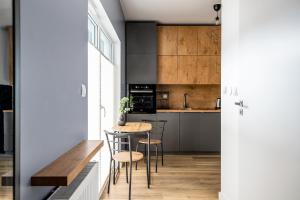 Kuchyň nebo kuchyňský kout v ubytování ADLER CHILL Apartments