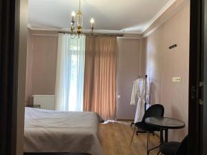 Postel nebo postele na pokoji v ubytování Guest House Four Seasons