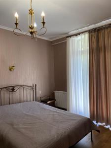 Postel nebo postele na pokoji v ubytování Guest House Four Seasons