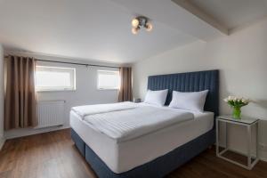 Posteľ alebo postele v izbe v ubytovaní Prague Tales Boutique Residence by Dwellfort