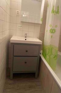 Ванная комната в Apartman “ROSE”