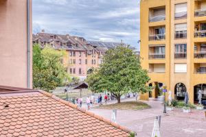 a view of a city from a building at Passage des bains in Annecy