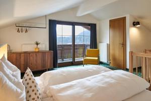 Posteľ alebo postele v izbe v ubytovaní Ferien Seminar Retreat - Zugspitze