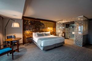 Katil atau katil-katil dalam bilik di Hotel Cumbres Lastarria