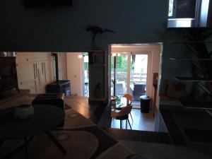 Posezení v ubytování Le Héron ( Gîte )