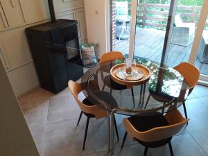 Posezení v ubytování Le Héron ( Gîte )