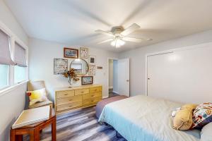 Ένα ή περισσότερα κρεβάτια σε δωμάτιο στο Calloway Drive Retreat