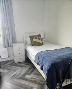 Postel nebo postele na pokoji v ubytování Finner House