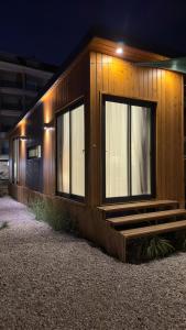 a building with windows on the side of it at Tiny House Sitesi in Alanya
