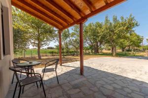 Patio nebo venkovní prostory v ubytování Fragkos Doukas Rooms