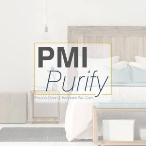 AmagansettUnit 821 Ocean Colony Beach的一张带有“pmr purify”标志的床