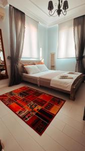 Postel nebo postele na pokoji v ubytování ALAÇATI XL LUXURY HOTEL