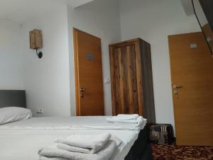 Ένα ή περισσότερα κρεβάτια σε δωμάτιο στο Residence Mahala +41 φωτογραφίες