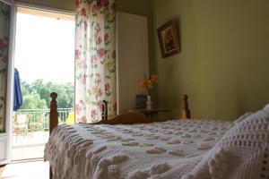 Кровать или кровати в номере Maison d'Hotes du Vert Vallon