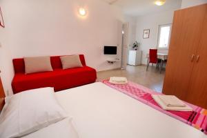 Postel nebo postele na pokoji v ubytování Cvita apartments