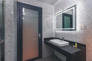 Un baño de Lyz Business Hotel Piura