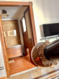 TV a/nebo společenská místnost v ubytování Appartamento in centro - Bellavista House + 17 fotografií