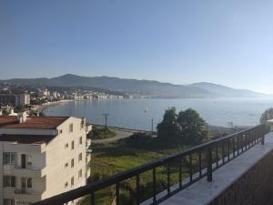 a view of the water from a balcony of a building at Yalova star in Çınarcık