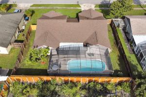 an overhead view of a house with a swimming pool at Luxury Villa in Orlando 4BD/3BA - 14 min Disney in Orlando