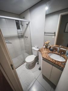 a bathroom with a toilet and a sink and a shower at Allianz Parque , Perdizes in Sao Paulo