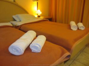 Postel nebo postele na pokoji v ubytování Hotel Lito