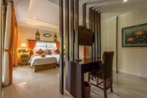 Letto o letti in una camera di Gefecon Villa Ubud