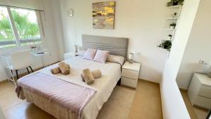 Postel nebo postele na pokoji v ubytování Apartamento en Resort De Golf