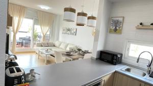 Kuchyň nebo kuchyňský kout v ubytování Apartamento en Resort De Golf