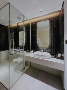 Koupelna v ubytování The Concept Hotel HCMC- District 1